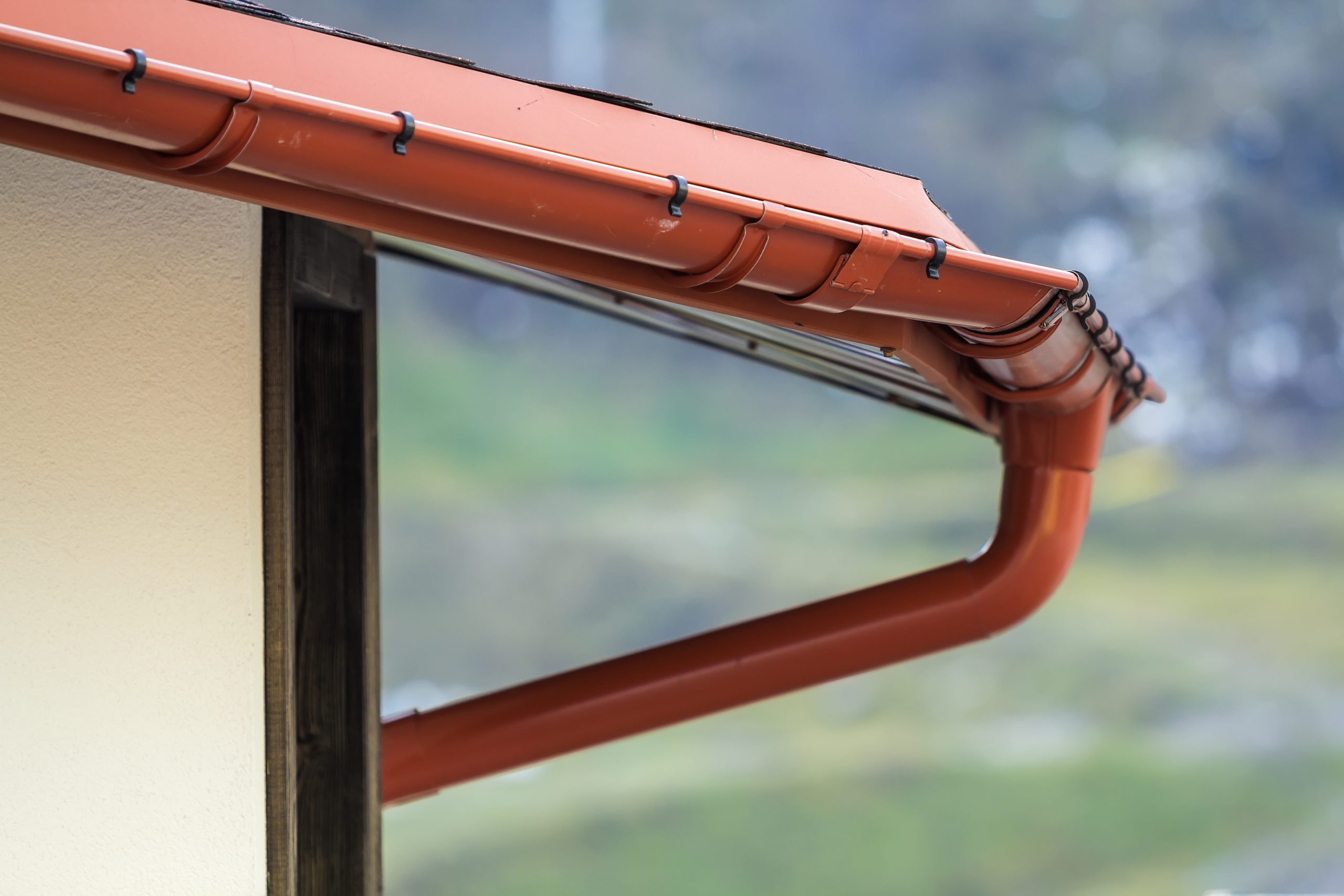 Detail image of new roof with gutter rain system Flat Roof Drainage