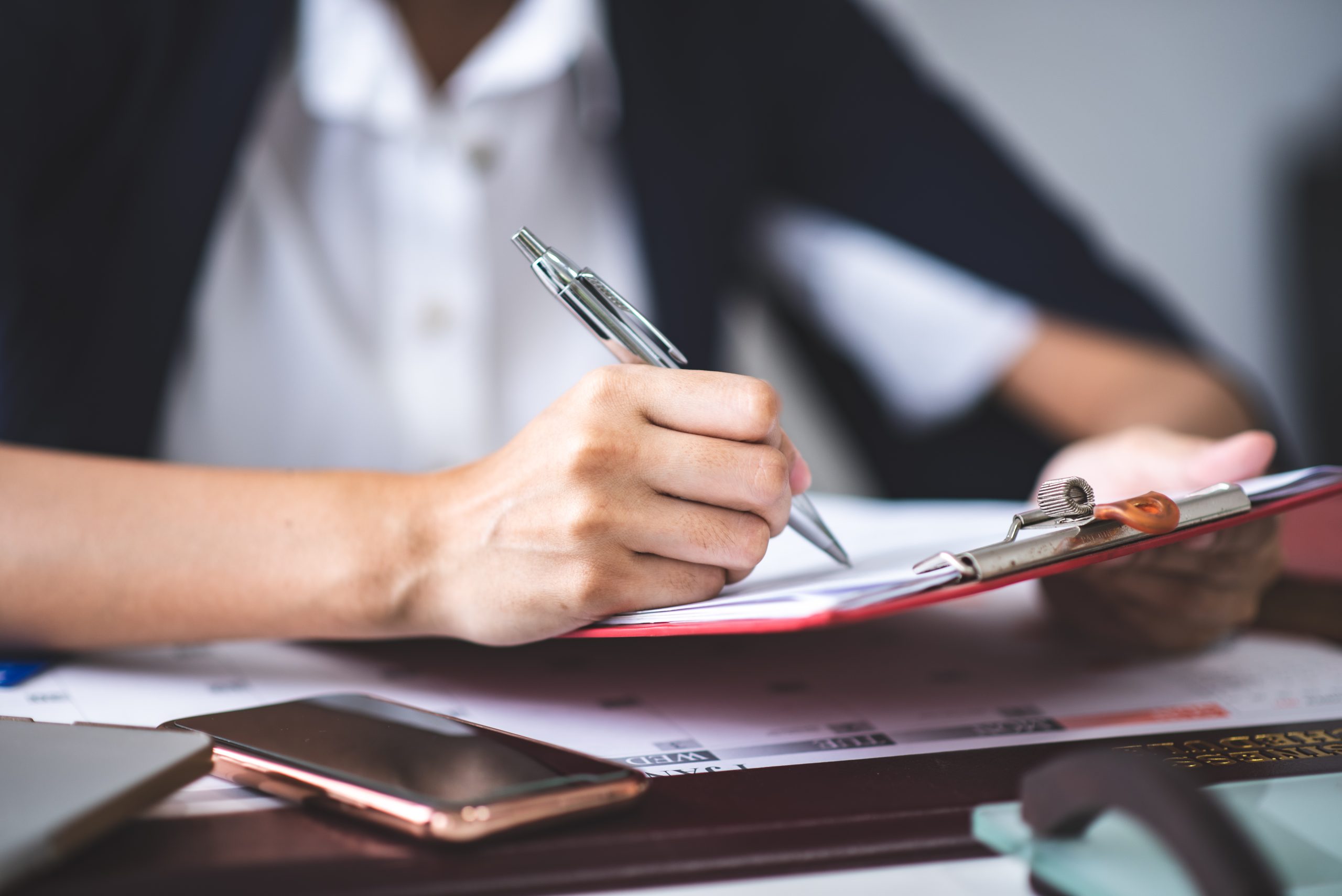 business approved stamp, permit document and certificate concept How much does it cost to get a permit for a reroof project?