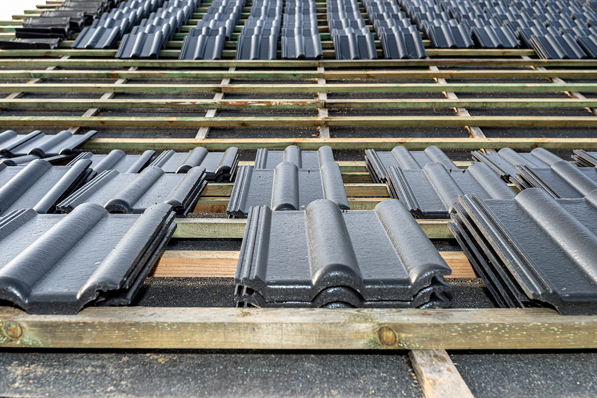 roof-ceramic-tile-arranged-in-packets-on-the-roof-2023-01-07-02-18-14-utc-(2) What is Roof Decking? (Benefits, Material used for roof decking, Cost, & More)
