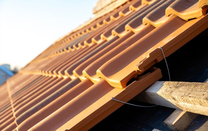 How Do Roofing Companies Work with Insurance Companies?