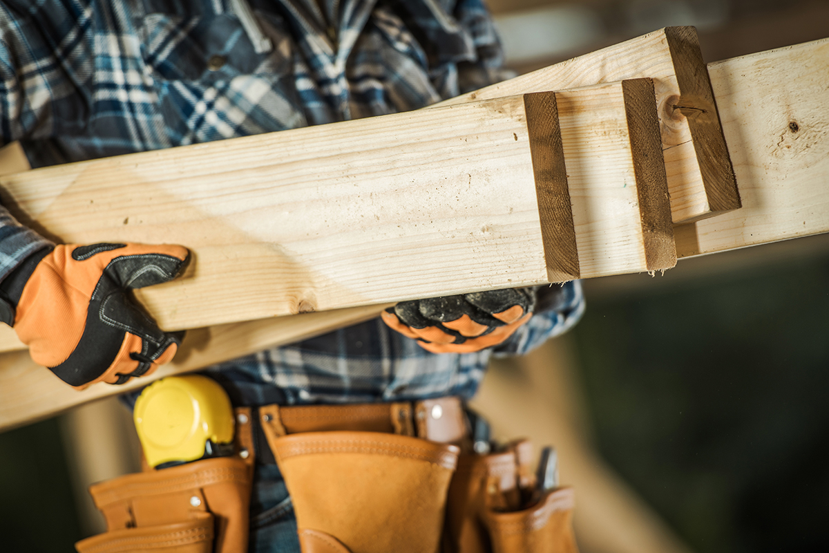 contractor-with-wood-2022-12-16-11-39-51-utc Affordable Roof Repair Services in Amarillo, TX