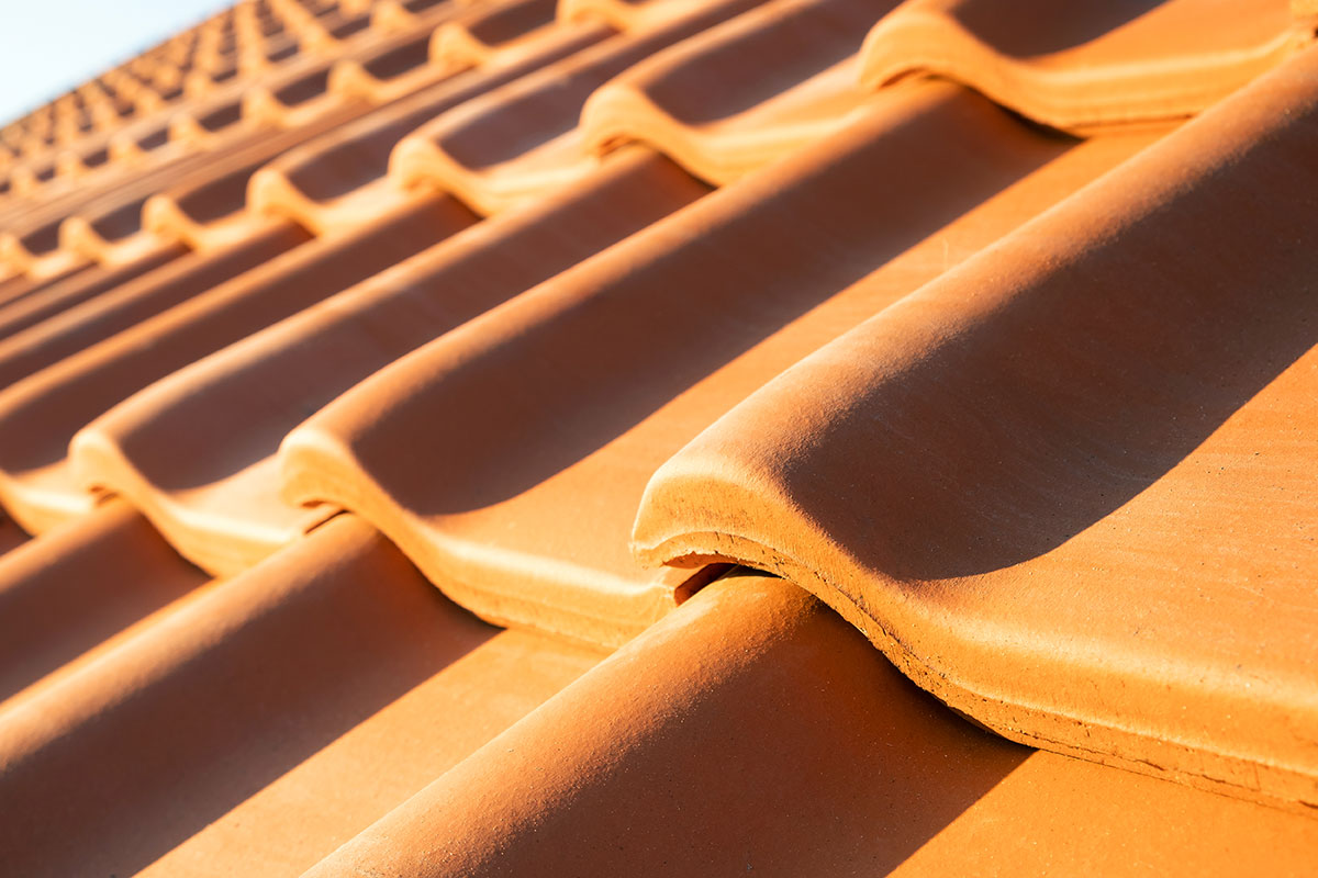 overlapping-rows-of-yellow-ceramic-roofing-tiles-c-2022-02-09-06-49-35-utc Roofing Material in Texas
