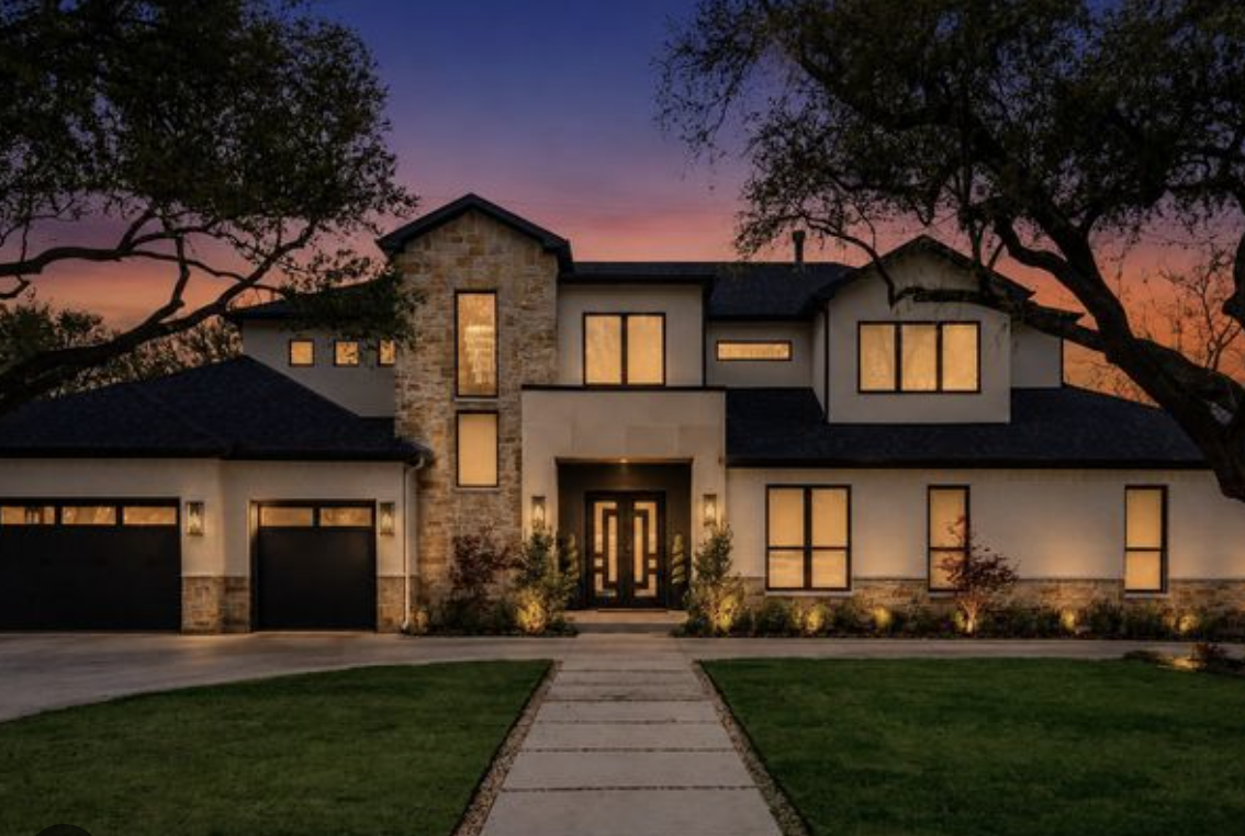 large house at sunset