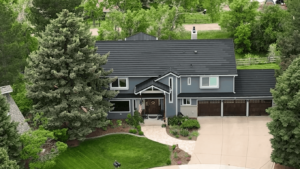 two story house in oklahoma city with new roof and storm damage repair