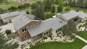 large house in lewisville texas with new roof and exterior brick siding repair
